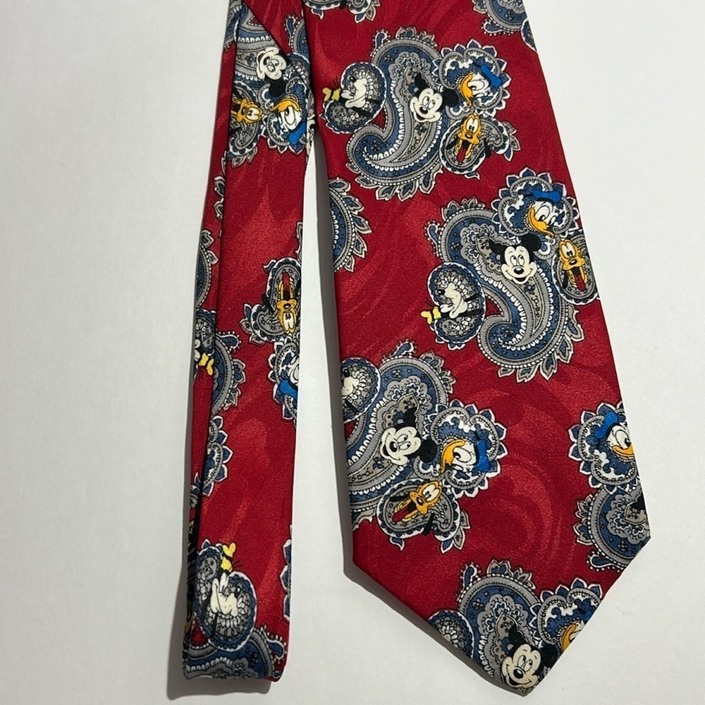 Disney necktie paisley print. 100% polyester. By Balancine INC. THE tie Works.